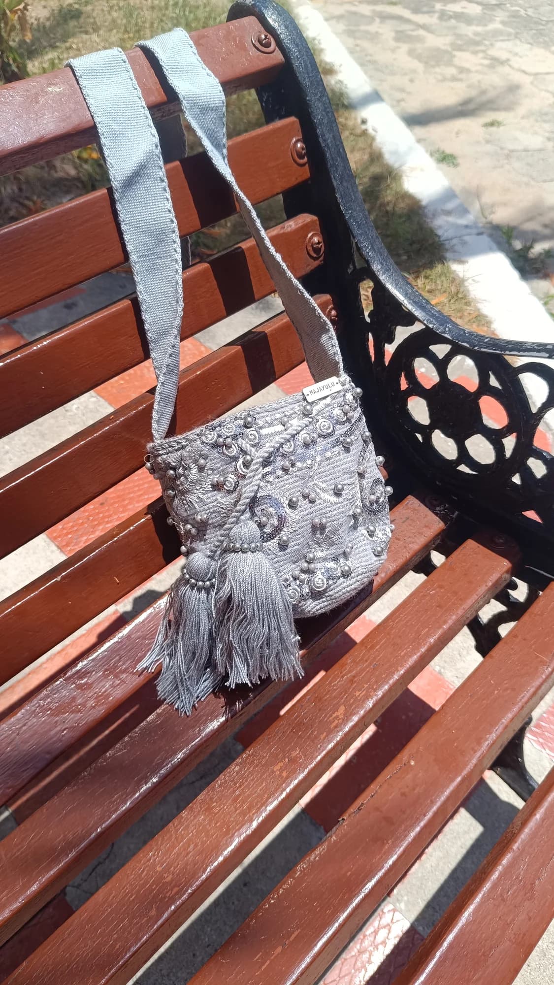 Mochila pequeña recamada